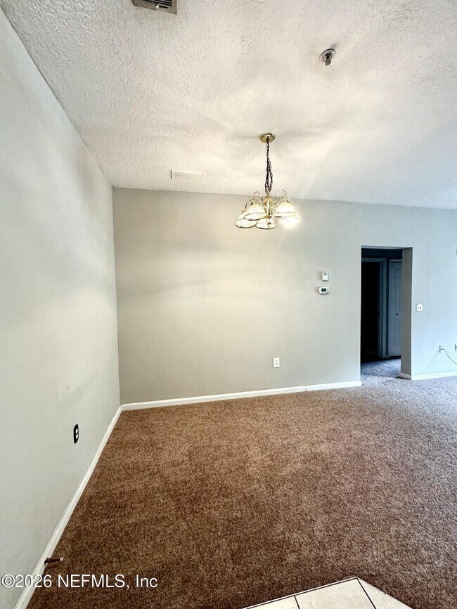 Building Photo - 6985 Ortega Woods Dr