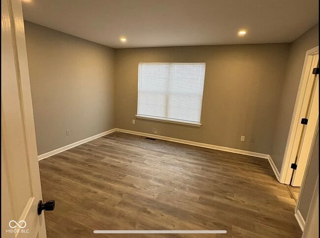 Building Photo - 6521 Rushing River