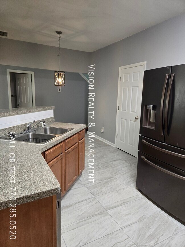 Foto del edificio - 4447 Ravenwood Dr