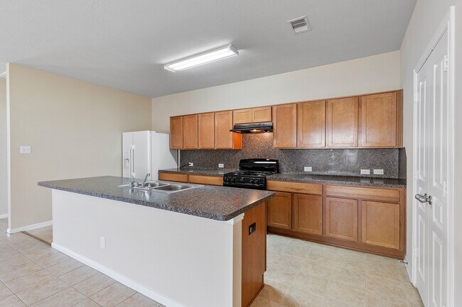 Building Photo - 10903 Woodwind Shadows Dr