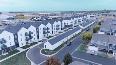 Building Photo - Prairie Towers - Lavish Living