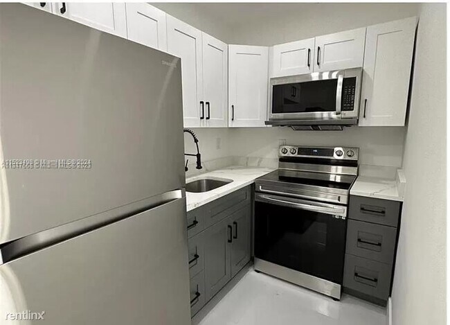 Foto del edificio - 5 br, 2 bath House - 103 NW 68th Ter # 103