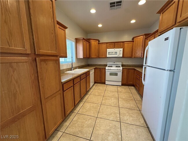 Foto del edificio - 5676 Rainbow Creek Ct