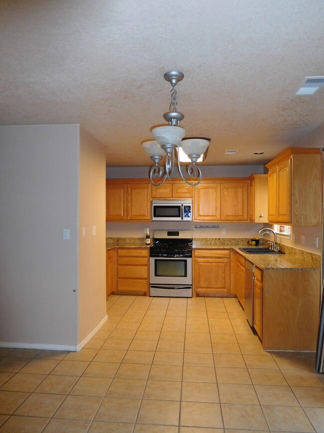 Building Photo - 7519 Treviso Ct NE