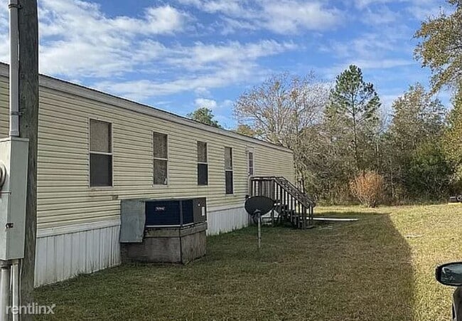 Building Photo - 3 br, 2 bath Mobile Home - 138 SW Deland Loop
