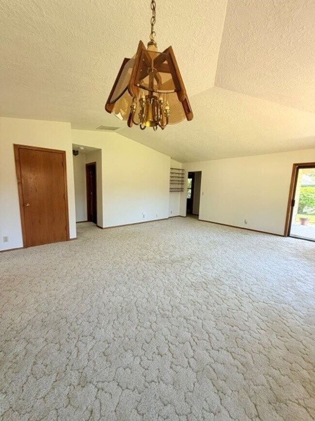 Building Photo - Charming 3-Bedroom Home with Garage & Lawn Care Included