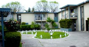 Building Photo - The Green Villa West Apartments