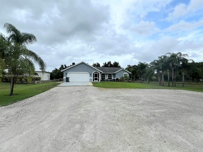 Building Photo - 6846 Royal Palm Beach Blvd