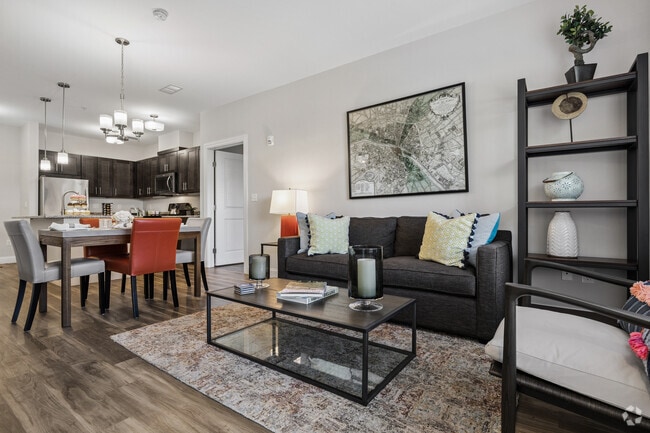 2BR, 2BA - 1,075SF - Living Room - Canal Crossing at Whitneyville West