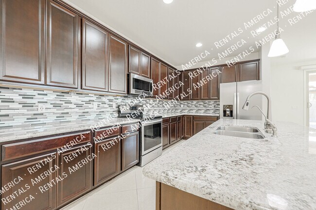 Building Photo - 10915 E Calypso Ave