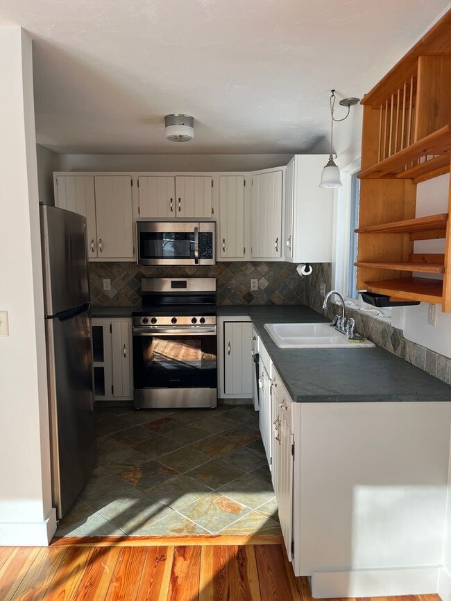 Building Photo - Completely renovated 2 bedroom, one and a half bath cottage style apartment. $2,300 per month plu...