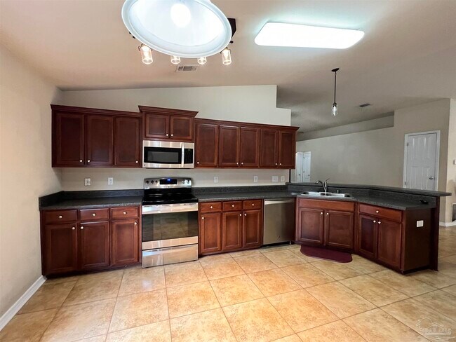 Building Photo - 4187 Roosevelt Way