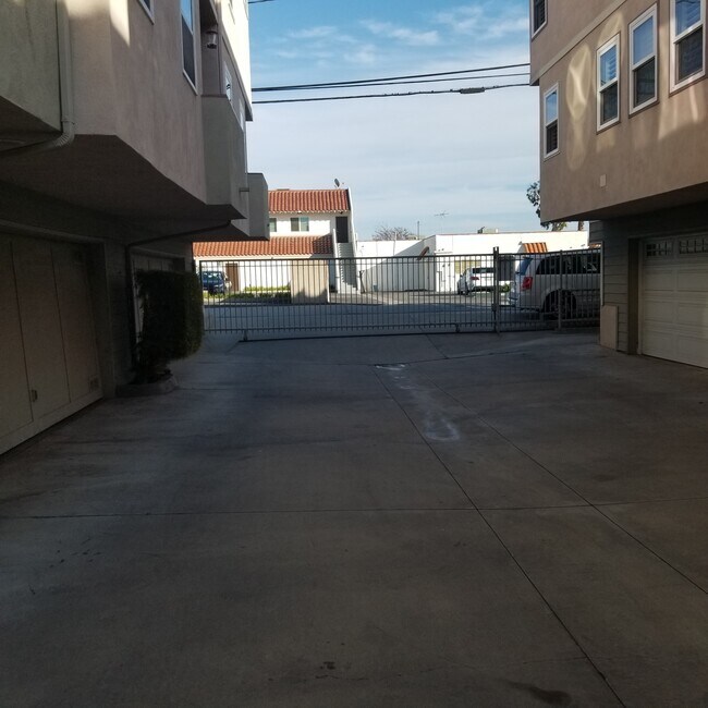 Gated common area with entrance to garage - 10766 Chestnut St