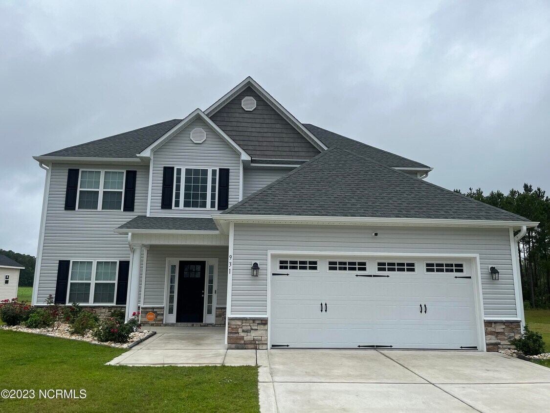 Foto principal - 931 Farmyard Garden Dr