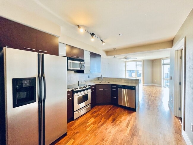 Building Photo - Stunning Top Floor Condo on Denny Way with...