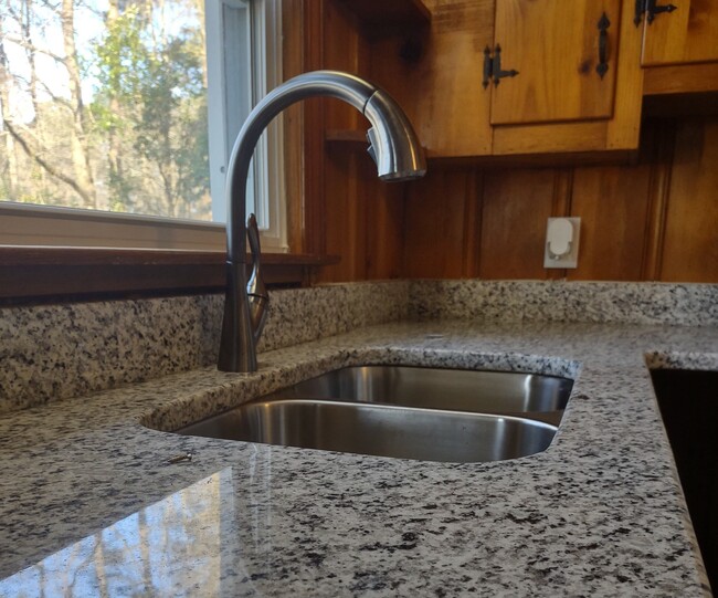 Granite counter tops - 1202 W Garner Rd