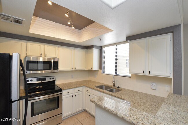 Building Photo - 4925 E Desert Cove Ave