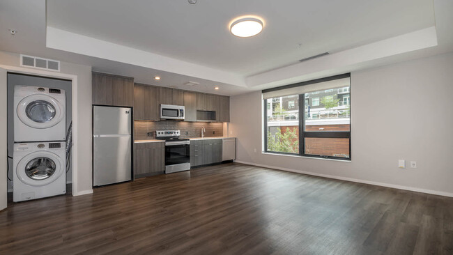 Kitchen with Stainless Steel Appliances and In-home Washer and Dryer - Milo