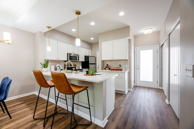 Experience contemporary living in this beautifully designed kitchen, perfect for culinary adventures. - The Gramercy