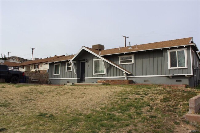 Building Photo - 38637 Yucca Tree St