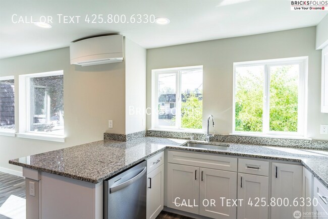 Building Photo - Welcome to Comfort and Charm in Your Monro...