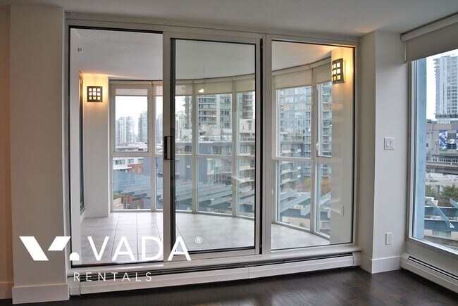 Photo du bâtiment - Paris Place 2 Bedroom Apartment For Rent 7...