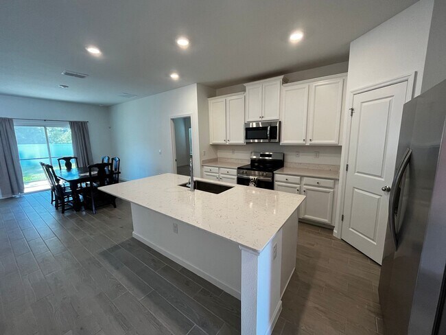 Building Photo - 2BR+Den in 55&up Community Liberty Village...
