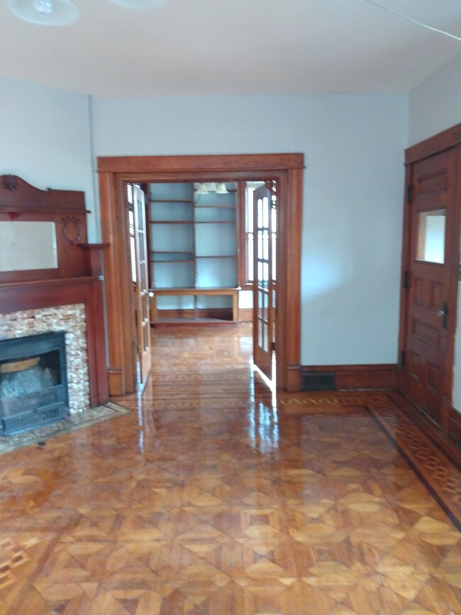 Living room and den/dining room - 504 S 5th St