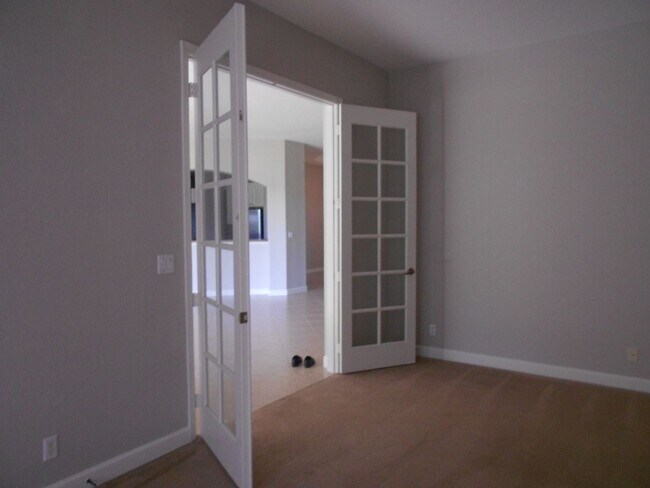 Building Photo - SPACIOUS 3/2 IN SAINT JAMES GOLF COMMUNITY