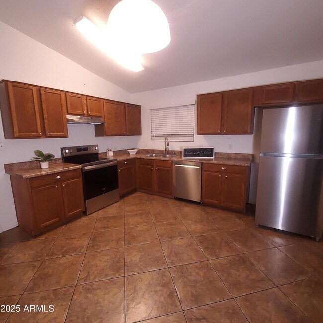 Building Photo - 8511 W College Dr