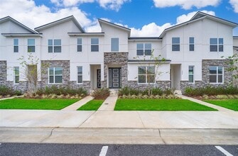 Building Photo - 1852 Tropical Palms Cir