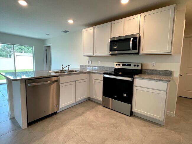 Building Photo - 8575 Triumph Cir