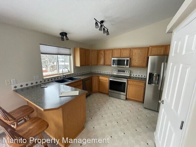 Building Photo - 4 br, 3 bath House - Woodland Park Dr. 801...