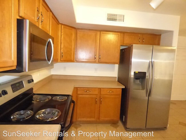 Building Photo - 4 br, 2.5 bath House - 12830 W La Reata Ave