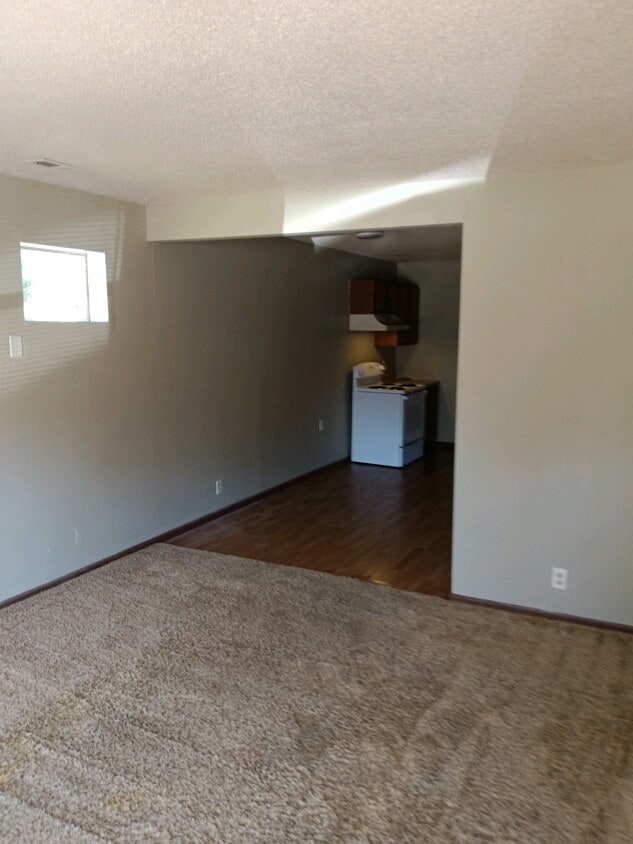Front room into kitchen - 6211 N 28th Street Ter