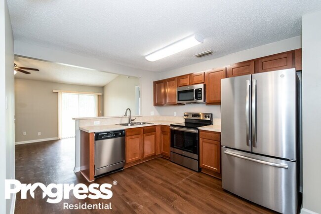 Building Photo - 7574 Falcon Trace Dr W