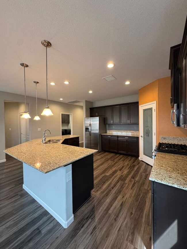 Building Photo - Spacious 4-Bedroom Dayton Home with Split-Bedroom Layout & Modern Finishes
