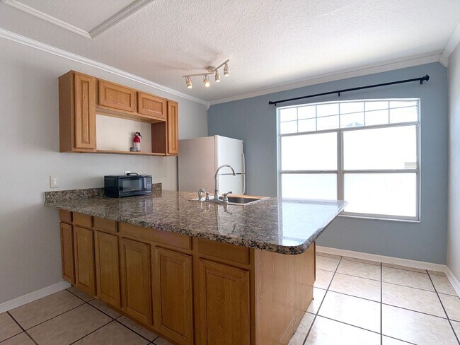 Building Photo - Move-in ready Efficiency in the Coveted Area of Four Corners Area—Water and Electric Included (wi...