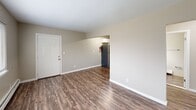 This 520 square foot apartment, located at 1730 Goddard Rd in Lincoln Park, Michigan, offers a compact yet functional living space. The single-story layout includes two bedrooms, one bathroom, and an open-concept kitchen and living area. The primary bedroom, measuring 120 square feet, provides ample space for a comfortable retreat.

The apartment showcases recent renovations with a neutral color palette throughout. Plush carpeting in the bedrooms offers warmth and comfort, while durable wood-look flooring in the main living areas adds a modern touch and easy maintenance. Large windows in each room allow for natural light, creating a bright and airy atmosphere.

The updated kitchen features white cabinetry, subway tile backsplash, and stainless steel appliances, including a refrigerator, range, and over-the-range microwave. The bathroom is outfitted with a white vanity, toilet, and a shower/tub combination, all complemented by the continuation of the wood-look flooring.

Energy-efficient baseboard heating and a window air conditioning unit provide climate control. The apartment's layout maximizes the use of space, with strategically placed closets for storage. This cozy home offers a blend of modern amenities and efficient design, ideal for those seeking a manageable living space in a convenient location.