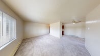 Located at 9 Brandyway Ln in Maumee, OH, this single-floor, one-bedroom, one-bathroom home offers a practical and well-organized layout. The living area is generously sized, featuring neutral carpet flooring, a ceiling fan, and a textured ceiling. A wall-mounted air conditioning unit and baseboard heating provide year-round climate control, while a large window lets in natural light and outdoor views. The space flows openly, with a partial wall dividing the living area from the kitchen corridor. The kitchen is equipped with warm wood-toned cabinetry, a double-basin sink, a dishwasher, and a refrigerator, complemented by easy-to-clean tile flooring. An adjacent dining area connects seamlessly to the kitchen for convenient daily use. The spacious primary bedroom features plush carpet, two large double-door closets providing ample storage, baseboard heating, and multiple windows that fill the room with natural light. Additional storage is provided by three closets throughout the home, along with a dedicated utility room. The bathroom includes a full tub/shower combo, a vanity with wood cabinetry, a white countertop, and charming mosaic tile flooring. Textured ceilings are present throughout the home, adding a consistent design element across all rooms.