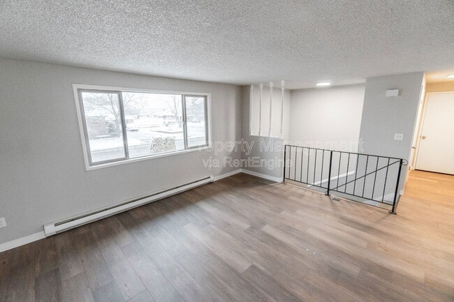 Building Photo - 10119 E Empire Ave