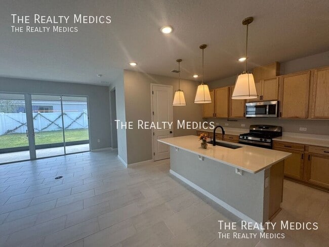 Building Photo - 5089 Meadow Song Dr