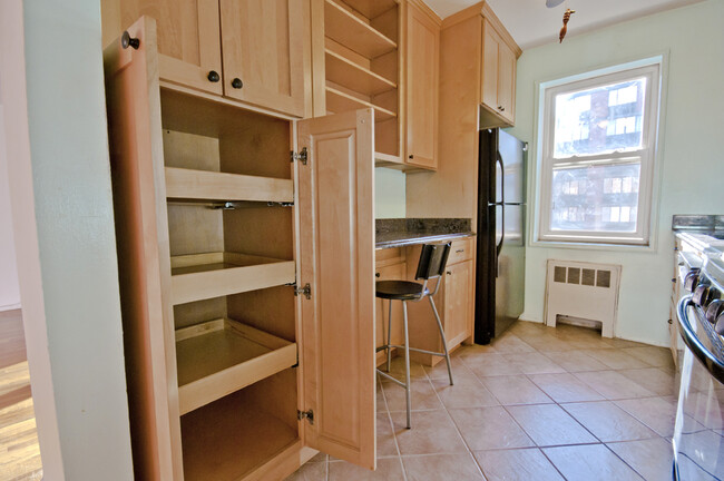 Custom cabinets with sliding shelves. - 30 E Hartsdale Ave