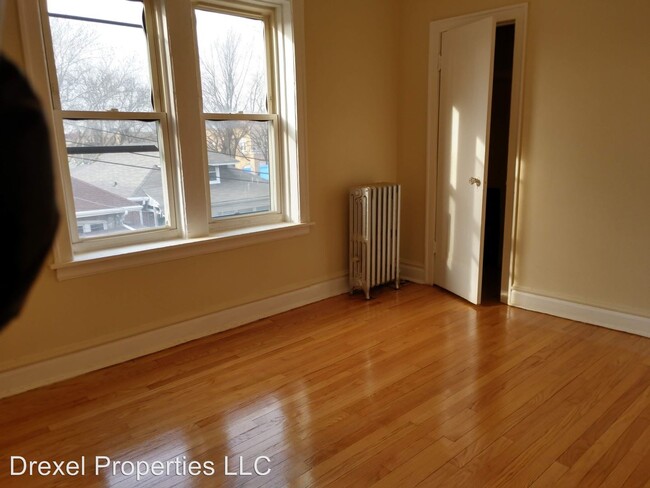 Building Photo - 6334 N Artesian Ave