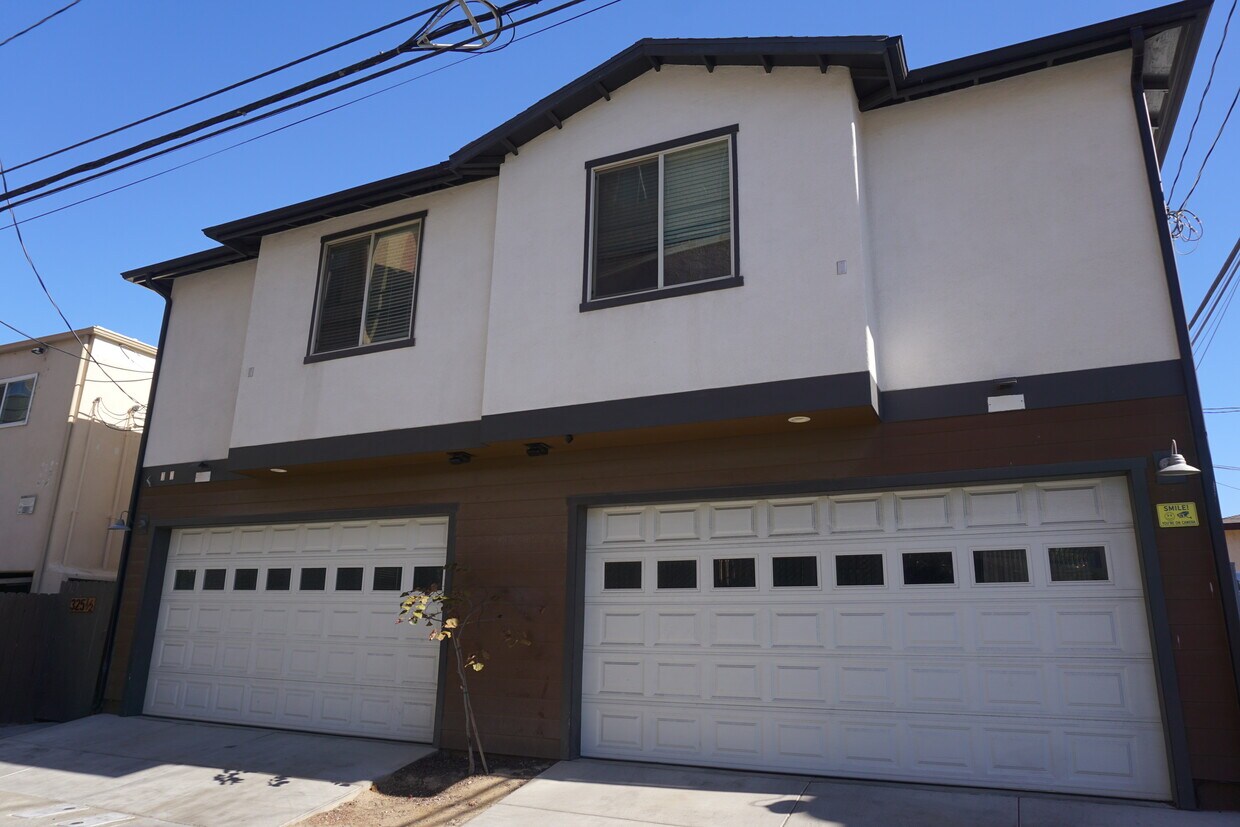 Front unit (on left) with 2 car attached garage - 325 1/2 Daisy Ave