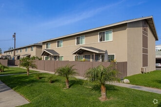 Building Photo - Sunrise Palms