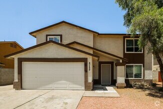 Building Photo - 8722 W Vernon Ave