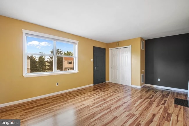 Living room view toward entry - 1 Dogwood Ln