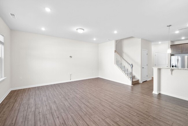 Building Photo - Luxury 3BR Townhome Near Costco & 540 – Built in 2023!