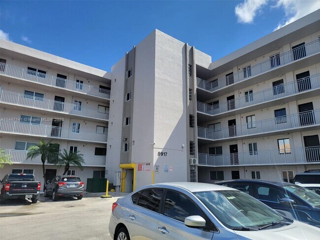 Building Photo - 9917 W Okeechobee Rd